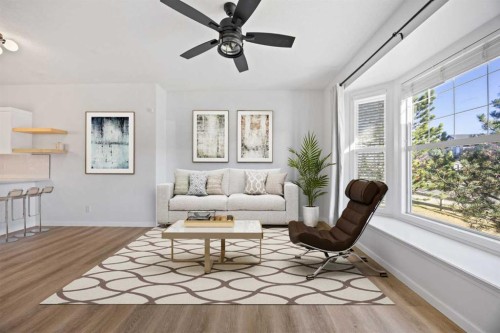 201-2066 Luxstone Boulevard Sw, Airdrie, AB - Indoor Photo Showing Living Room