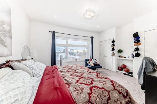 108-1632 20 Avenue Nw, Calgary, AB - Indoor Photo Showing Bedroom