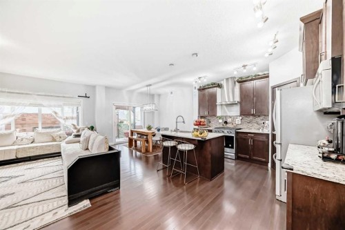 165 Hillcrest Drive Sw, Airdrie, AB - Indoor Photo Showing Kitchen With Upgraded Kitchen