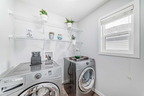 165 Hillcrest Drive Sw, Airdrie, AB - Indoor Photo Showing Laundry Room