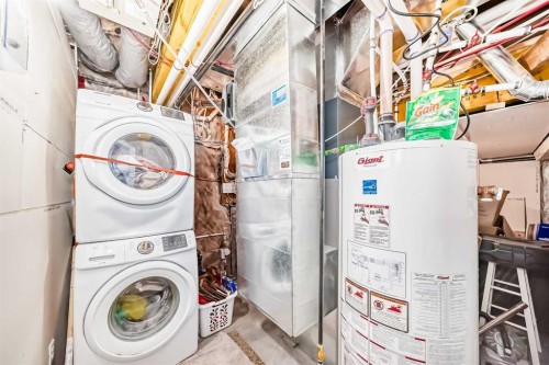 165 Hillcrest Drive Sw, Airdrie, AB - Indoor Photo Showing Laundry Room