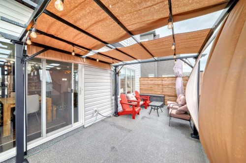 165 Hillcrest Drive Sw, Airdrie, AB - Outdoor With Deck Patio Veranda With Exterior