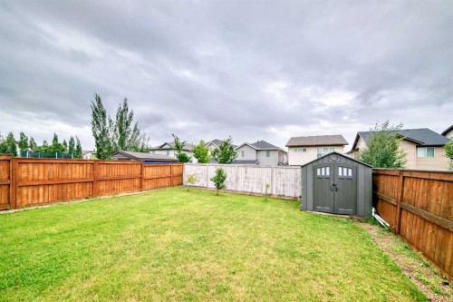165 Hillcrest Drive Sw, Airdrie, AB - Outdoor With Backyard