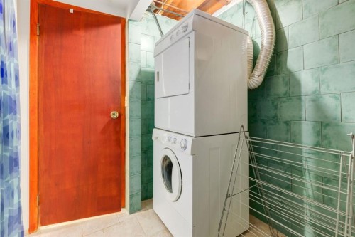 90 Allandale Close Se, Calgary, AB - Indoor Photo Showing Laundry Room