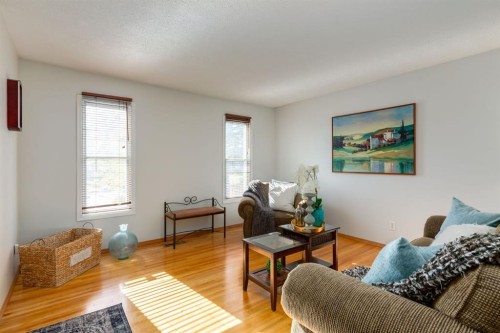90 Allandale Close Se, Calgary, AB - Indoor Photo Showing Living Room