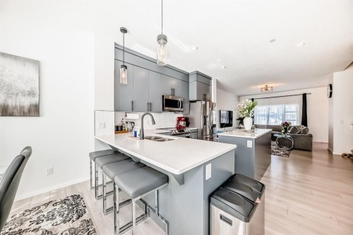 215 148 Avenue Nw, Calgary, AB - Indoor Photo Showing Kitchen With Double Sink
