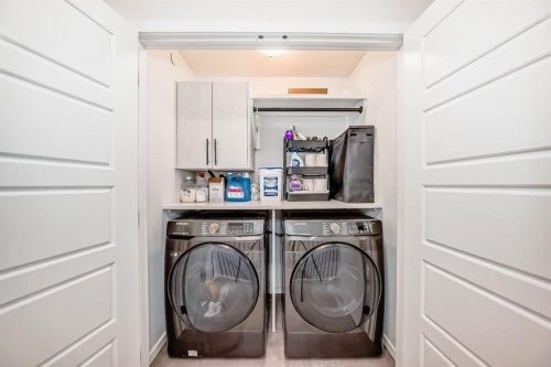 215 148 Avenue Nw, Calgary, AB - Indoor Photo Showing Laundry Room