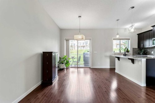 160 Sunset Point, Cochrane, AB - Indoor Photo Showing Kitchen With Upgraded Kitchen