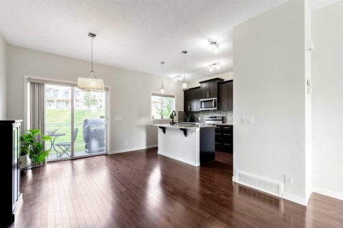 160 Sunset Point, Cochrane, AB - Indoor Photo Showing Other Room