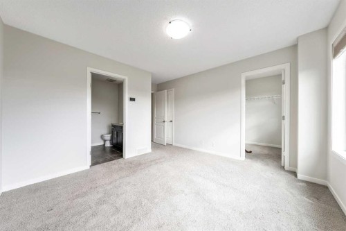 160 Sunset Point, Cochrane, AB - Indoor Photo Showing Other Room