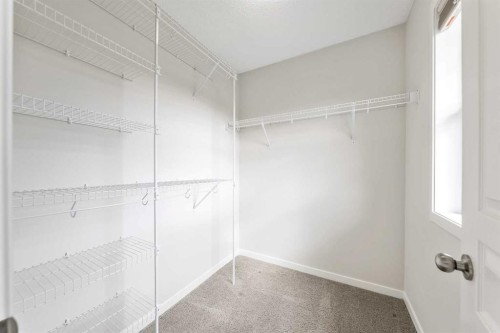 160 Sunset Point, Cochrane, AB - Indoor With Storage