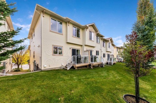 160 Sunset Point, Cochrane, AB - Outdoor With Deck Patio Veranda