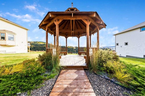 160 Sunset Point, Cochrane, AB - Outdoor With Deck Patio Veranda