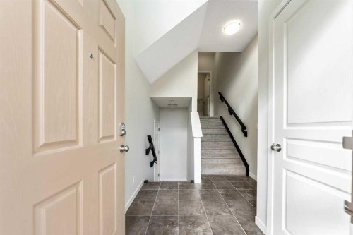 160 Sunset Point, Cochrane, AB - Indoor Photo Showing Other Room