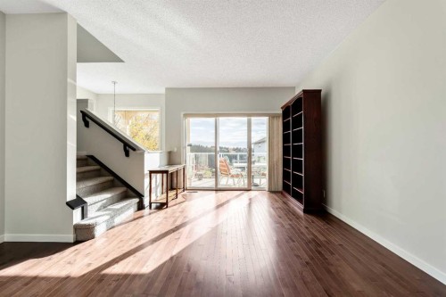 160 Sunset Point, Cochrane, AB - Indoor Photo Showing Other Room