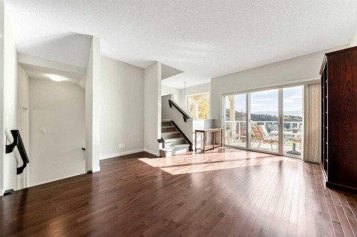 160 Sunset Point, Cochrane, AB - Indoor Photo Showing Other Room