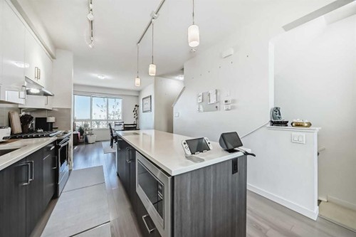 122 Sherwood Lane Nw, Calgary, AB - Indoor Photo Showing Kitchen With Upgraded Kitchen