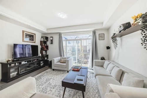 122 Sherwood Lane Nw, Calgary, AB - Indoor Photo Showing Living Room