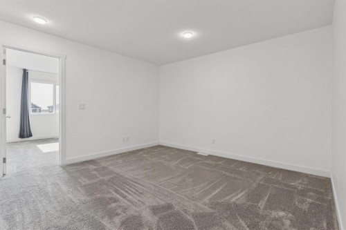 113 Calhoun Common Ne, Calgary, AB - Indoor Photo Showing Other Room