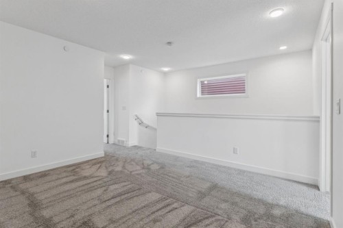 113 Calhoun Common Ne, Calgary, AB - Indoor Photo Showing Other Room