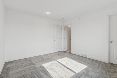 113 Calhoun Common Ne, Calgary, AB - Indoor Photo Showing Other Room