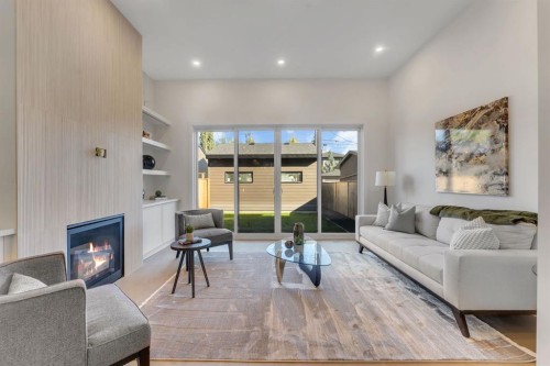 5020 21A Street Sw, Calgary, AB - Indoor Photo Showing Living Room With Fireplace