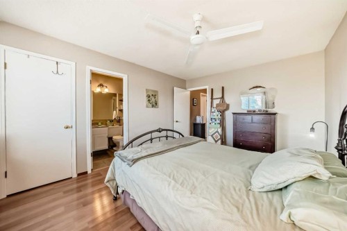 20 Rivergreen Crescent Se, Calgary, AB - Indoor Photo Showing Bedroom