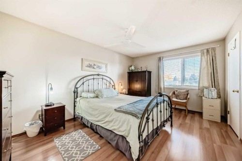 20 Rivergreen Crescent Se, Calgary, AB - Indoor Photo Showing Bedroom