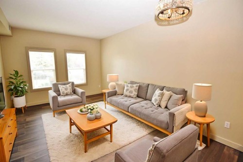 1708-11811 Lake Fraser Drive Se, Calgary, AB - Indoor Photo Showing Living Room