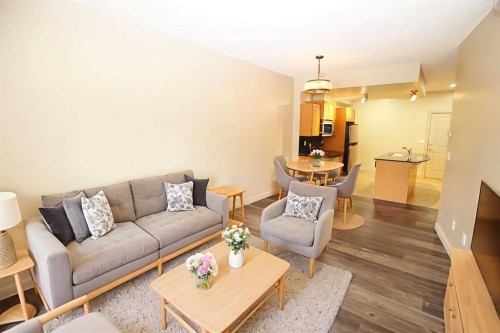 1708-11811 Lake Fraser Drive Se, Calgary, AB - Indoor Photo Showing Living Room