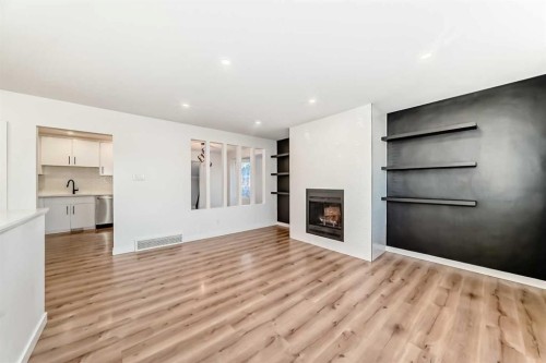 9803 Fairmount Drive Se, Calgary, AB - Indoor With Fireplace