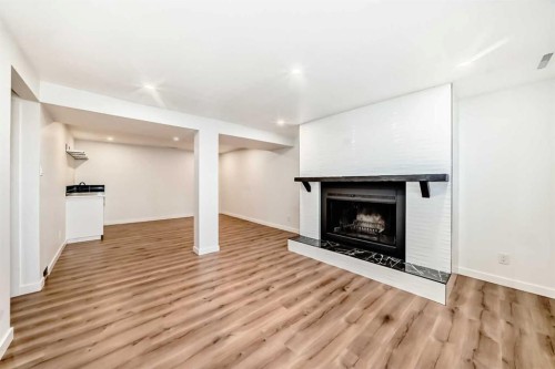 9803 Fairmount Drive Se, Calgary, AB - Indoor With Fireplace