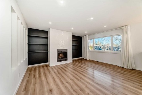 9803 Fairmount Drive Se, Calgary, AB - Indoor With Fireplace