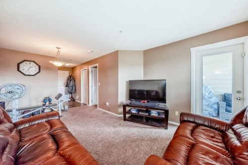 2324-81 Legacy Boulevard Se, Calgary, AB - Indoor Photo Showing Living Room