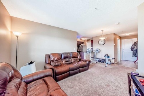 2324-81 Legacy Boulevard Se, Calgary, AB - Indoor Photo Showing Living Room