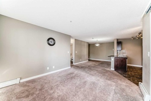 8201-403 Mackenzie Way Sw, Airdrie, AB - Indoor Photo Showing Other Room