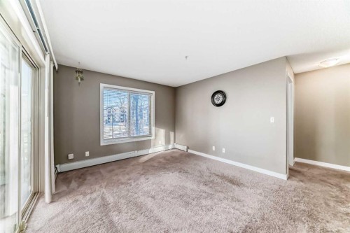 8201-403 Mackenzie Way Sw, Airdrie, AB - Indoor Photo Showing Other Room
