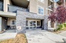 8201-403 Mackenzie Way Sw, Airdrie, AB  - Outdoor With Balcony 