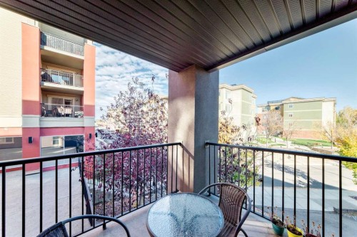 8201-403 Mackenzie Way Sw, Airdrie, AB - Outdoor With Balcony With Exterior