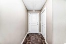 8201-403 Mackenzie Way Sw, Airdrie, AB  - Indoor Photo Showing Other Room 