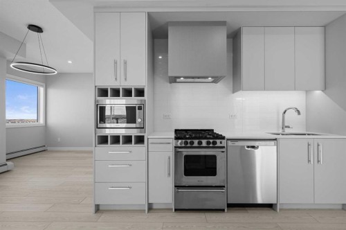601-8230 Broadcast Avenue Sw, Calgary, AB - Indoor Photo Showing Kitchen With Upgraded Kitchen