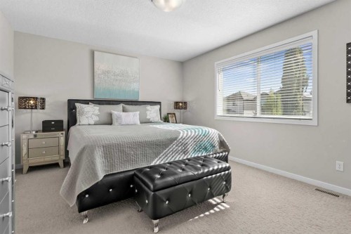 510 Cranston Drive Se, Calgary, AB - Indoor Photo Showing Bedroom