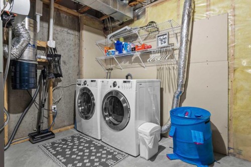 510 Cranston Drive Se, Calgary, AB - Indoor Photo Showing Laundry Room