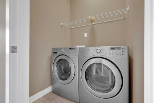 87 Baysprings Way Sw, Airdrie, AB - Indoor Photo Showing Laundry Room
