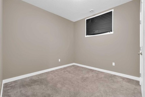 87 Baysprings Way Sw, Airdrie, AB - Indoor Photo Showing Other Room