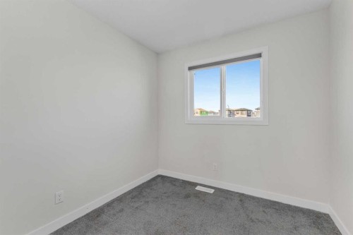 33 Belmont Drive Sw, Calgary, AB - Indoor Photo Showing Other Room