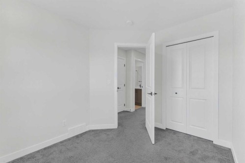33 Belmont Drive Sw, Calgary, AB - Indoor Photo Showing Other Room