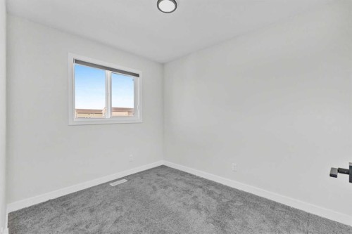 33 Belmont Drive Sw, Calgary, AB - Indoor Photo Showing Other Room
