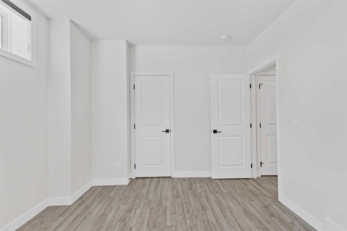 33 Belmont Drive Sw, Calgary, AB - Indoor Photo Showing Other Room