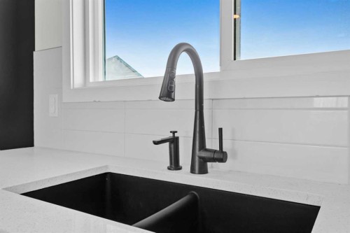 33 Belmont Drive Sw, Calgary, AB - Indoor Photo Showing Kitchen With Double Sink